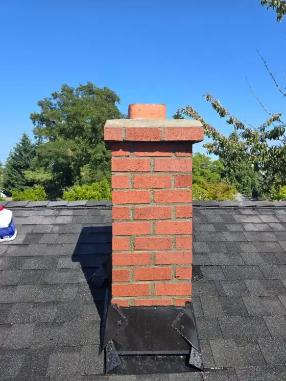 The same narrow chimney with a new straight crown, before the cap was installed